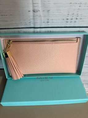 Blush Pink Tassel Zip clutch